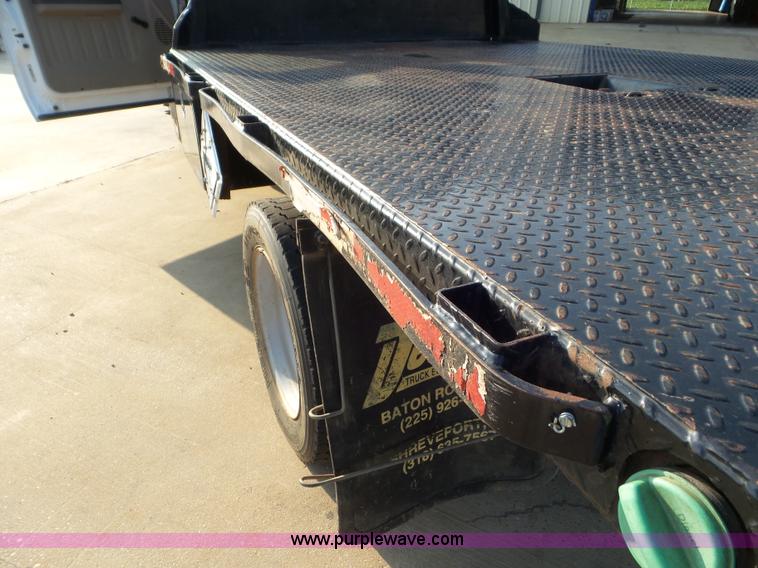 image for item L6749 2010 Ford 450 Super Duty flatbed truck
