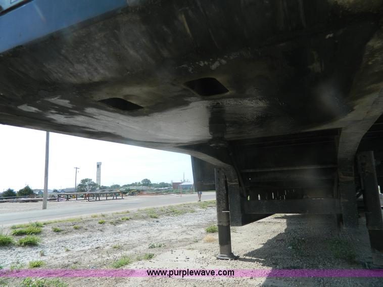 image for item J8879 2012 Transcraft DTL-2100 drop deck trailer