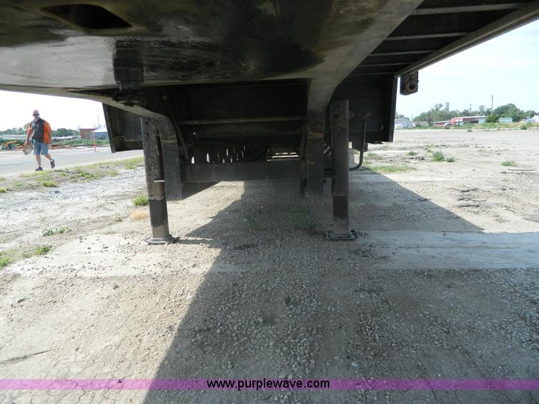 image for item J8879 2012 Transcraft DTL-2100 drop deck trailer