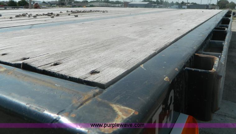 image for item J8879 2012 Transcraft DTL-2100 drop deck trailer