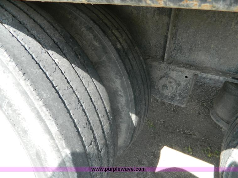 image for item J8879 2012 Transcraft DTL-2100 drop deck trailer