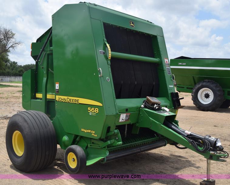 image for item CB9047 2013 John Deere 568 round baler