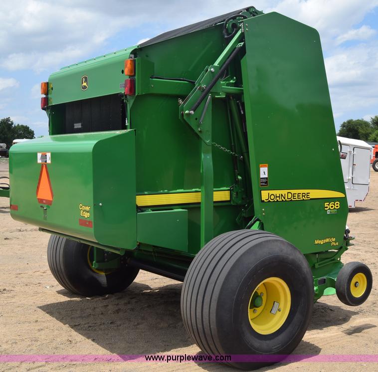 image for item CB9047 2013 John Deere 568 round baler