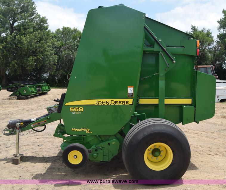 image for item CB9047 2013 John Deere 568 round baler
