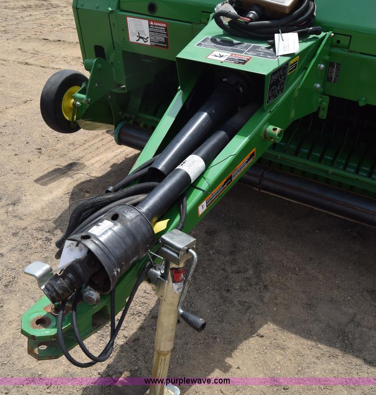 image for item CB9047 2013 John Deere 568 round baler
