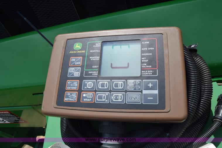 image for item CB9047 2013 John Deere 568 round baler