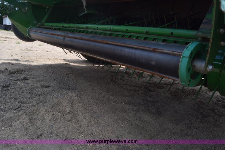 image for item CB9047 2013 John Deere 568 round baler