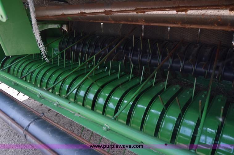image for item CB9047 2013 John Deere 568 round baler