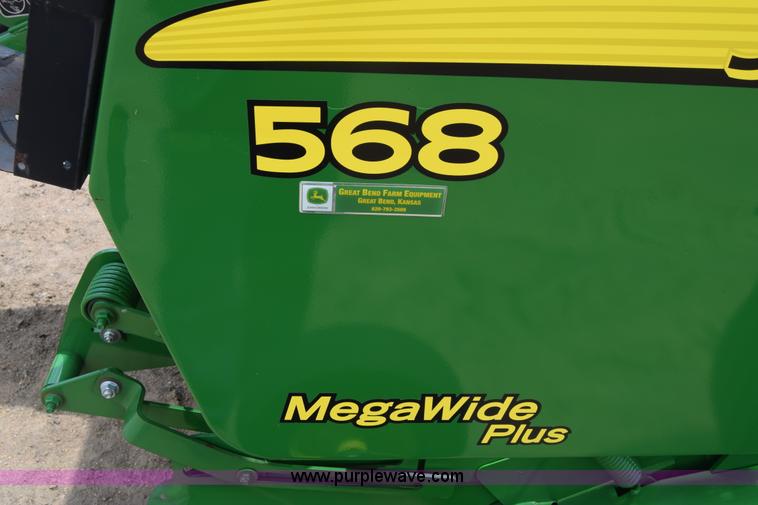 image for item CB9047 2013 John Deere 568 round baler