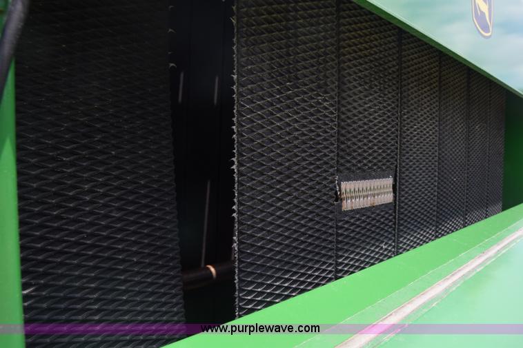 image for item CB9047 2013 John Deere 568 round baler