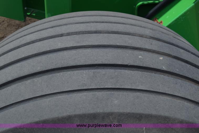 image for item CB9047 2013 John Deere 568 round baler