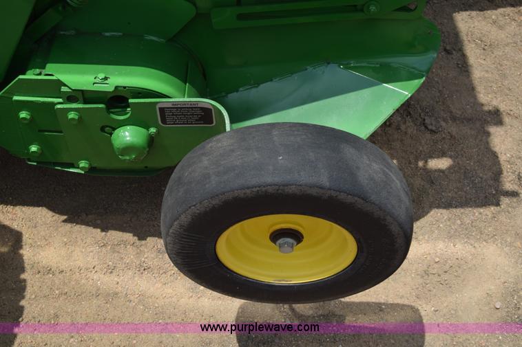 image for item CB9047 2013 John Deere 568 round baler