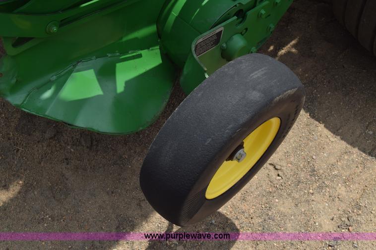 image for item CB9047 2013 John Deere 568 round baler