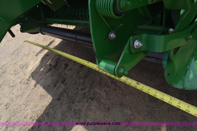 image for item CB9047 2013 John Deere 568 round baler