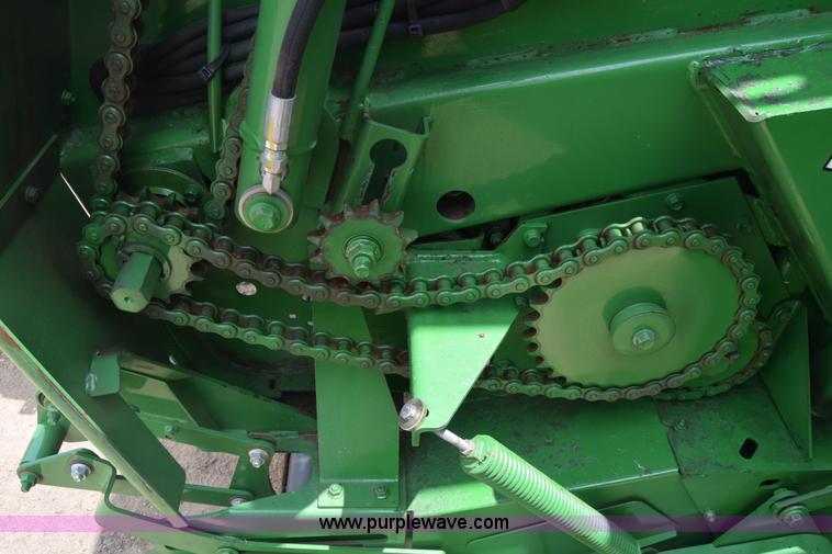 image for item CB9047 2013 John Deere 568 round baler