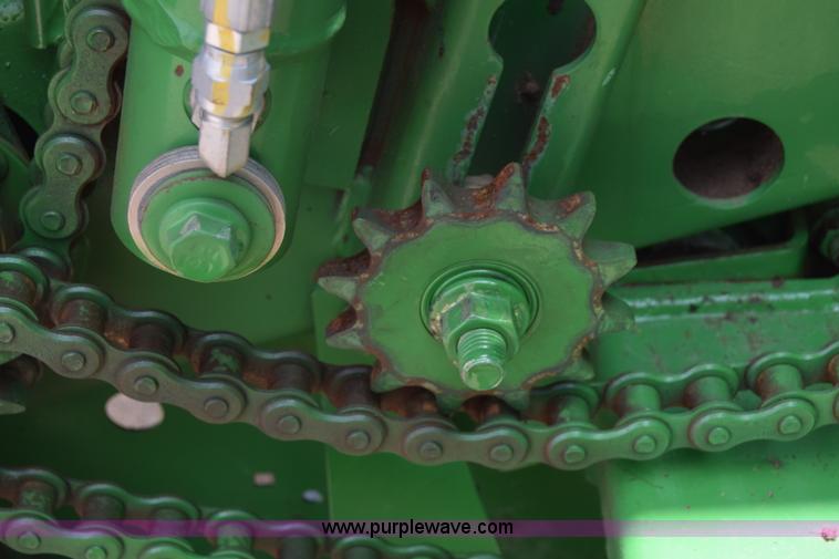 image for item CB9047 2013 John Deere 568 round baler