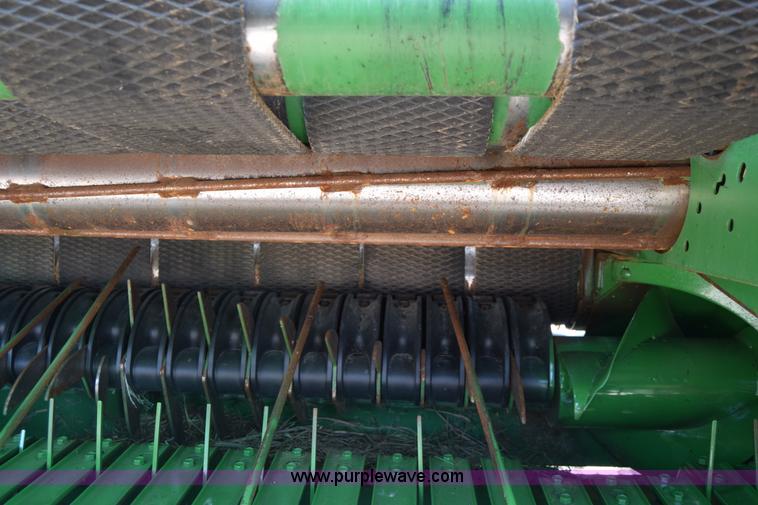 image for item CB9047 2013 John Deere 568 round baler