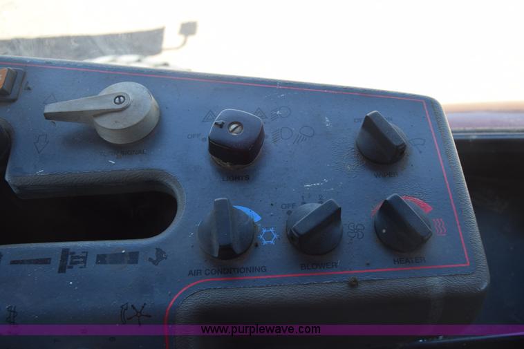 image for item CB9137 2001 MacDon 9350 Turbo windrower