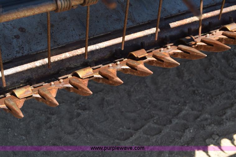 image for item CB9137 2001 MacDon 9350 Turbo windrower