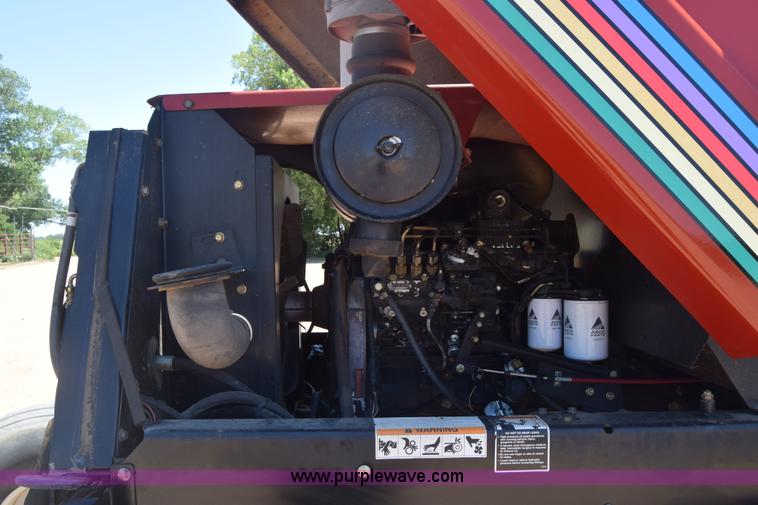 image for item CB9137 2001 MacDon 9350 Turbo windrower