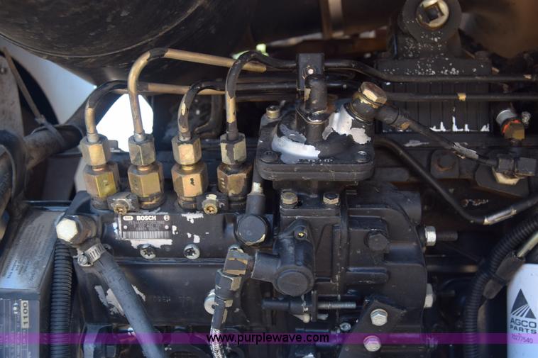 image for item CB9137 2001 MacDon 9350 Turbo windrower