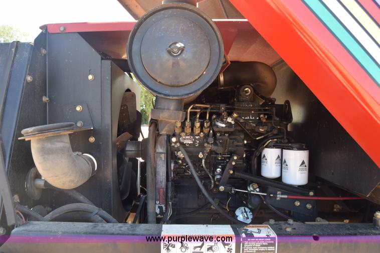 image for item CB9137 2001 MacDon 9350 Turbo windrower