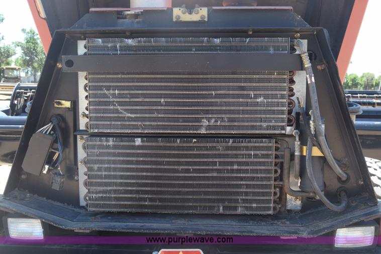 image for item CB9137 2001 MacDon 9350 Turbo windrower