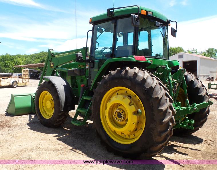 image for item J4853 2001 John Deere 7210 MFWD tractor