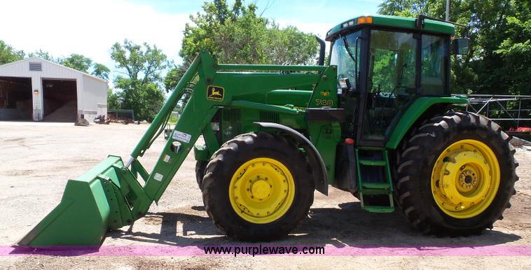 image for item J4853 2001 John Deere 7210 MFWD tractor