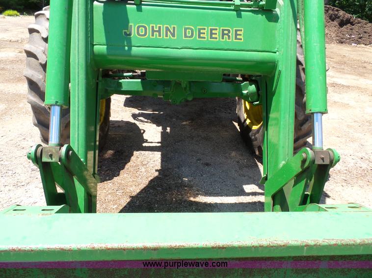 image for item J4853 2001 John Deere 7210 MFWD tractor