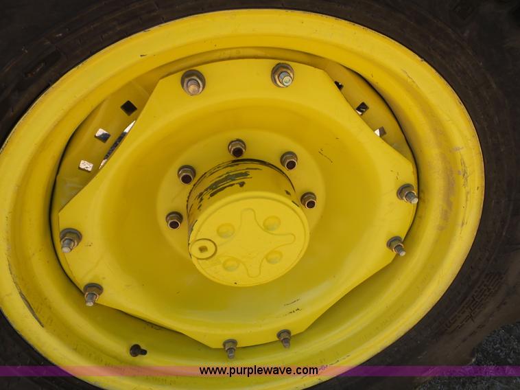 image for item J4853 2001 John Deere 7210 MFWD tractor