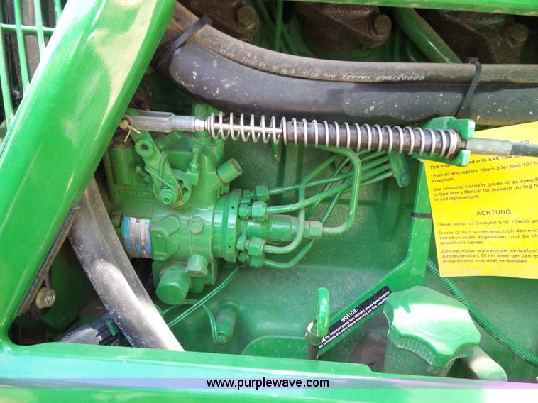 image for item J4853 2001 John Deere 7210 MFWD tractor