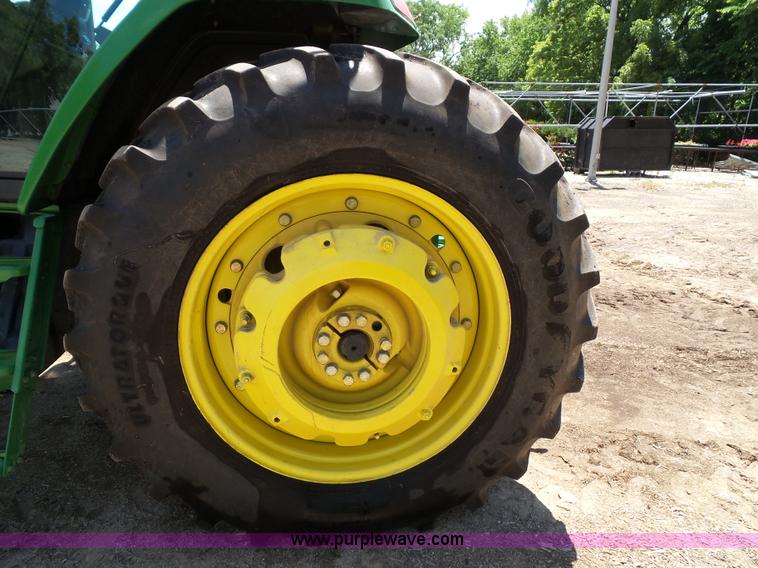 image for item J4853 2001 John Deere 7210 MFWD tractor