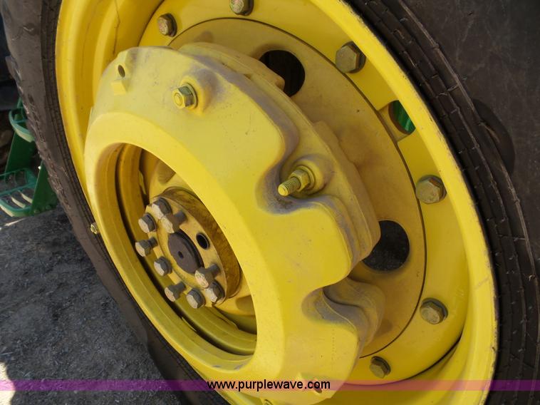 image for item J4853 2001 John Deere 7210 MFWD tractor