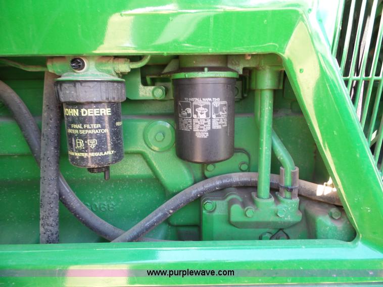 image for item J4853 2001 John Deere 7210 MFWD tractor
