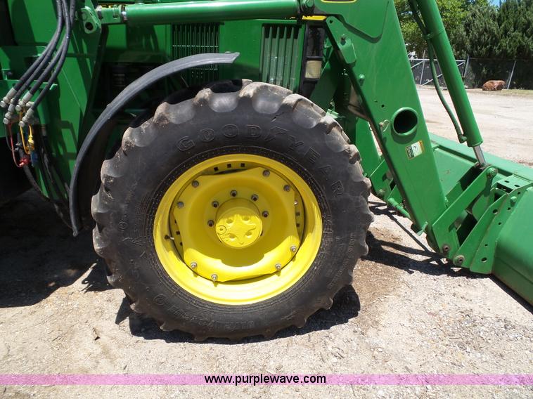 image for item J4853 2001 John Deere 7210 MFWD tractor