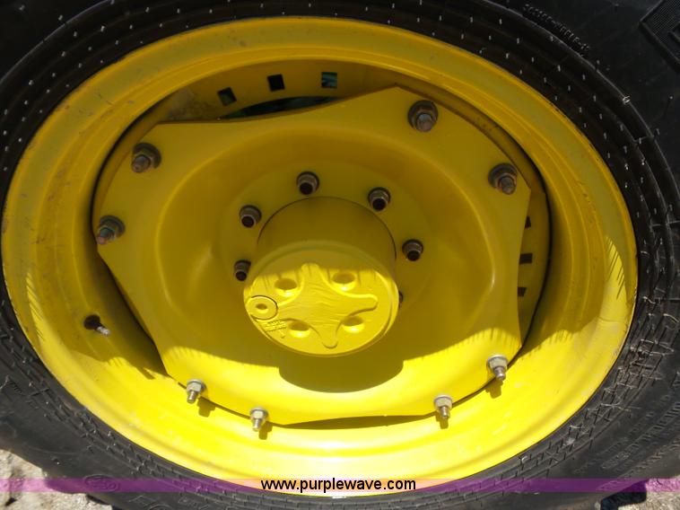 image for item J4853 2001 John Deere 7210 MFWD tractor