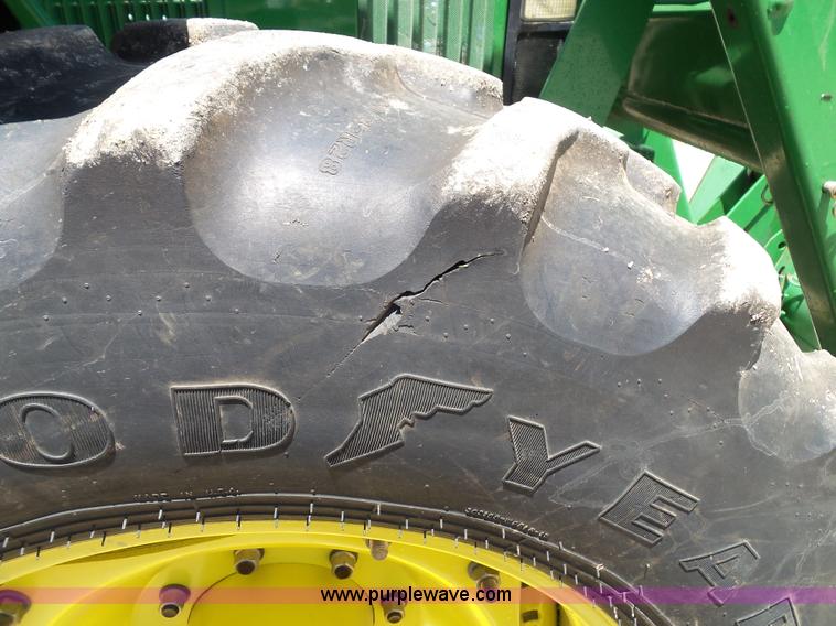 image for item J4853 2001 John Deere 7210 MFWD tractor