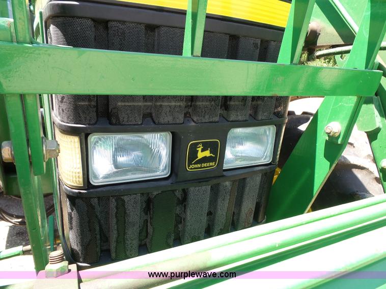 image for item J4853 2001 John Deere 7210 MFWD tractor