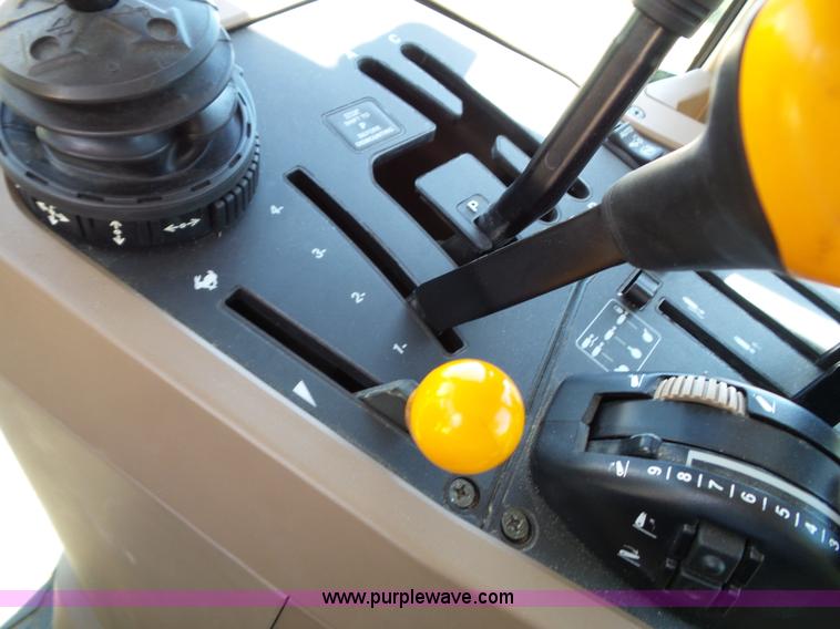 image for item J4853 2001 John Deere 7210 MFWD tractor