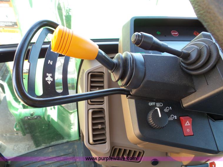 image for item J4853 2001 John Deere 7210 MFWD tractor