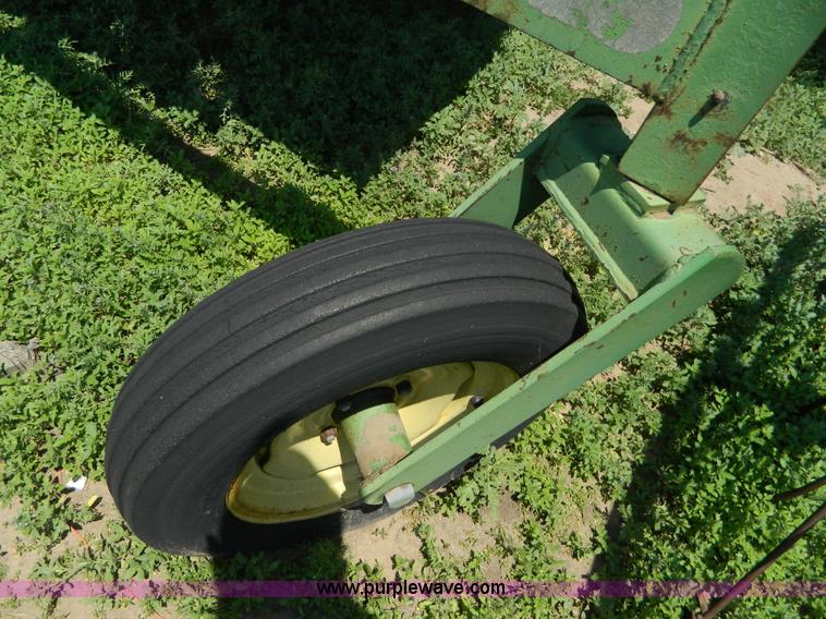 image for item J8860 John Deere self-propelled windrower