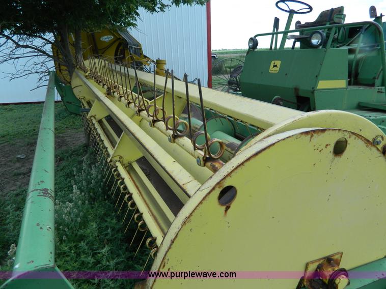 image for item J8860 John Deere self-propelled windrower