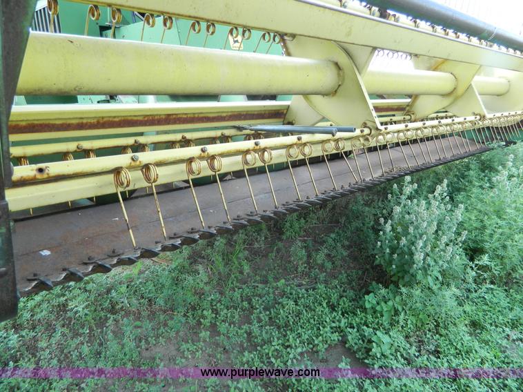 image for item J8860 John Deere self-propelled windrower