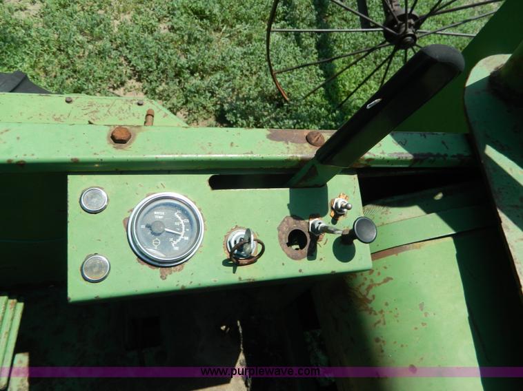 image for item J8860 John Deere self-propelled windrower