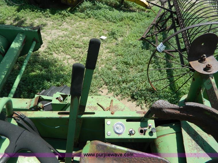 image for item J8860 John Deere self-propelled windrower
