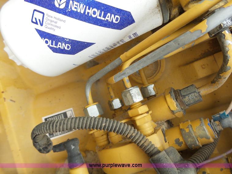 image for item L6170 New Holland 7740 tractor