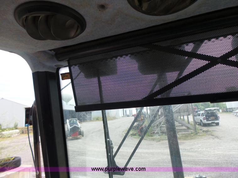 image for item L6170 New Holland 7740 tractor