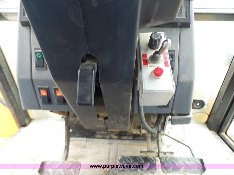 image for item L6170 New Holland 7740 tractor