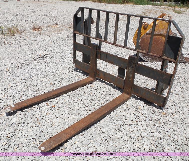Backhoe forks in Merriam, KS Item BG9439 sold Purple Wave
